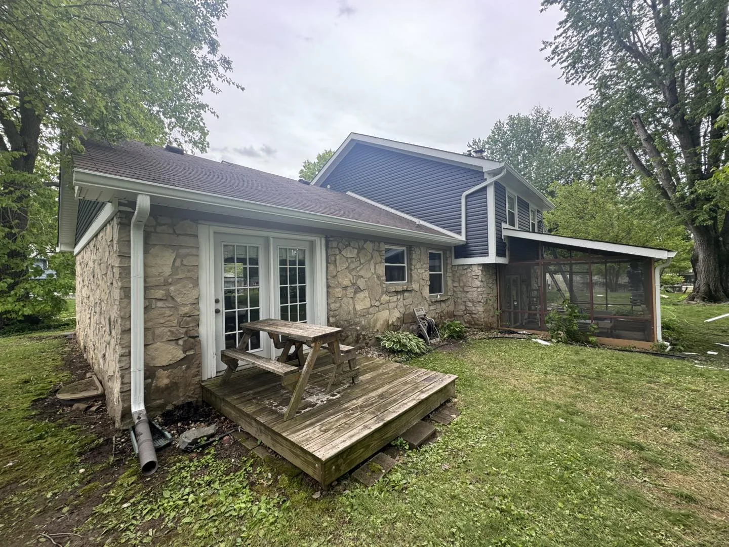Stone Patio Exterior by Bryant's Seamless Guttering