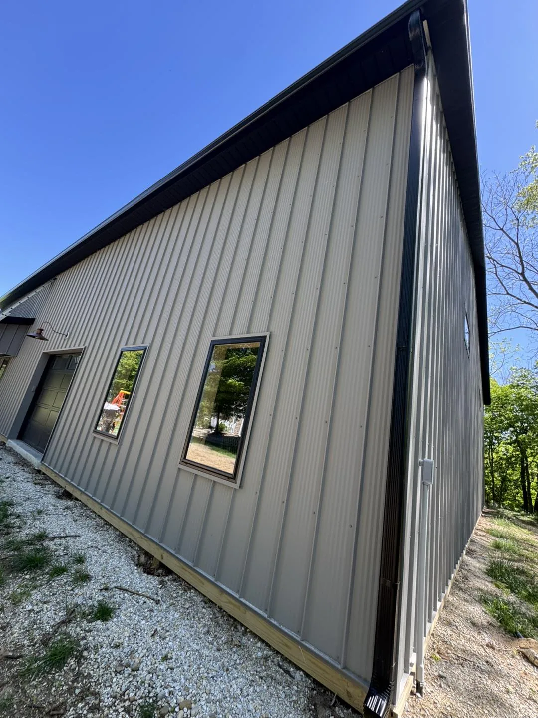 Tall Metal Siding by Bryant's Seamless Guttering
